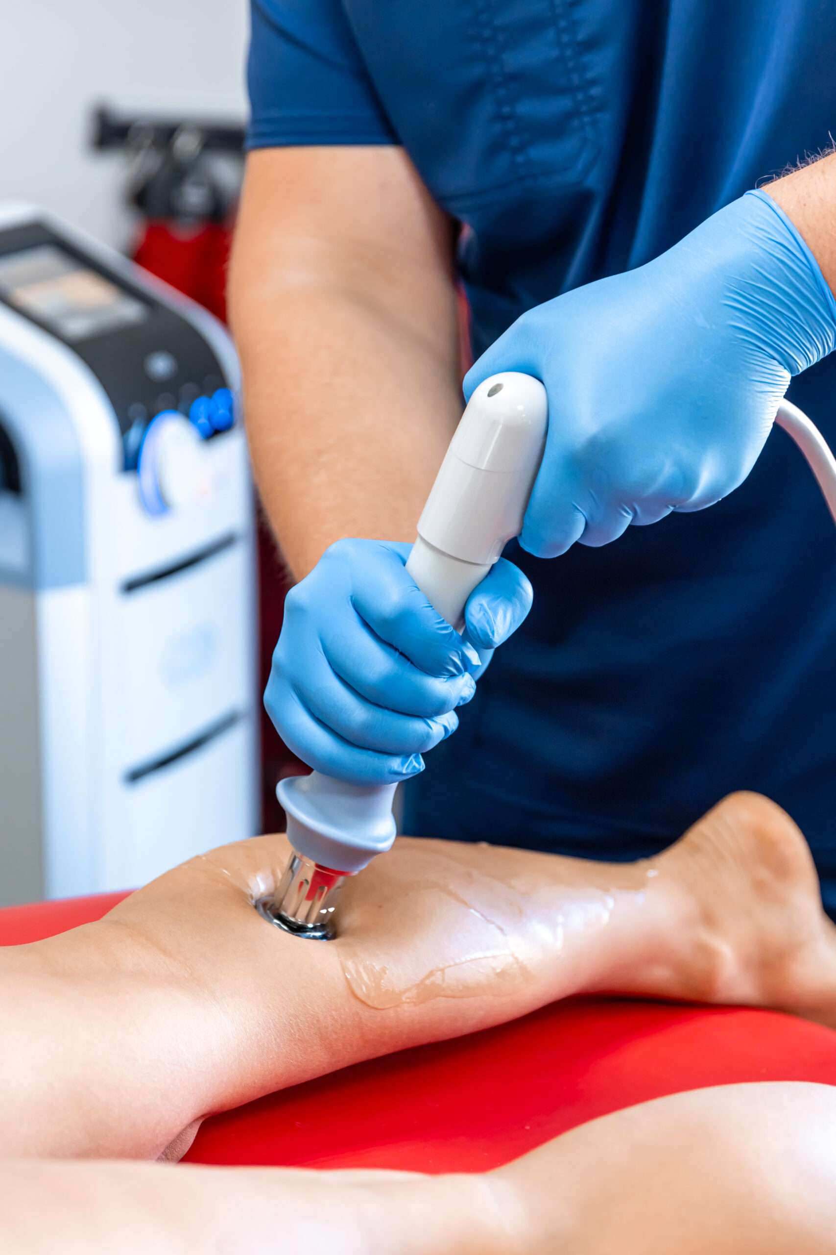 physical therapy of the shin with shock wave, extracorporeal shockwave therapy.